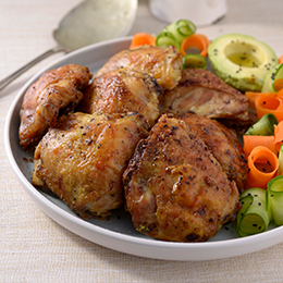 Baked Lemon and Garlic Chicken Thighs served with Cucumber & Carrot Ribbons
