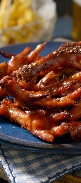 Crispy chicken feet and fried potatoes