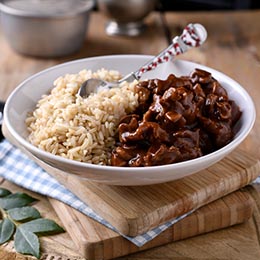 Curried chicken gizzards on a bed of rice