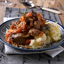 Crispy chicken livers on a bed of mashed potatoes