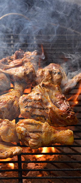 Peri-Peri Chicken Pieces Served With Salad and Sweet Potatoes