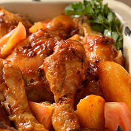 Roasted Chicken Pieces with Tomato, Red Onions, Garlic & Potatoes